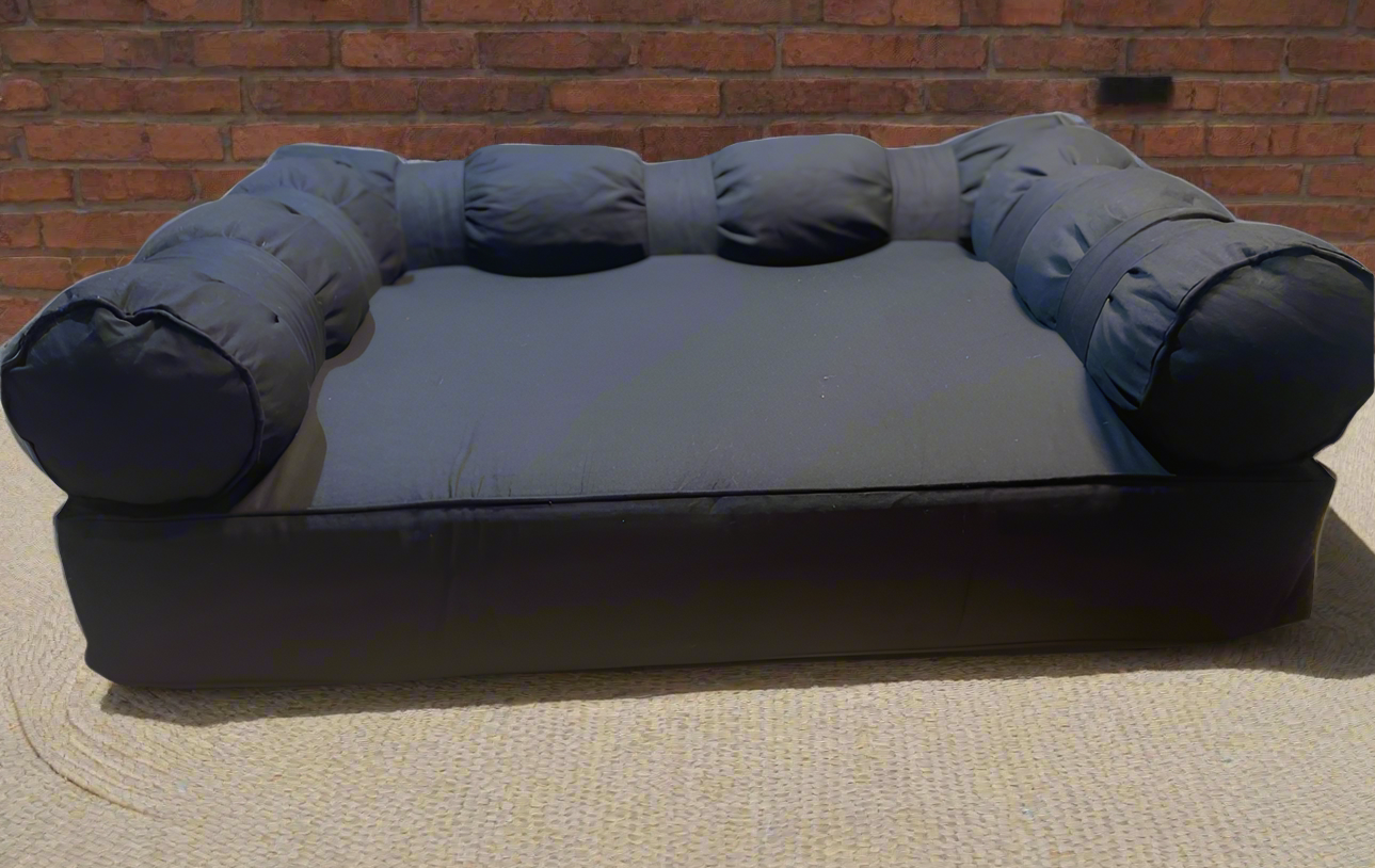 Large Eco Dog Couch with three bolster cushions featured in black