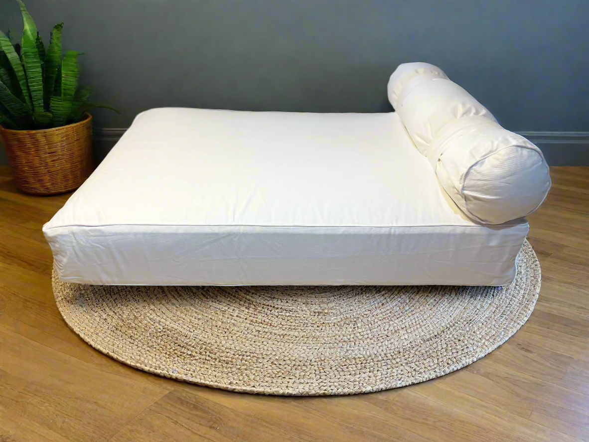 Large Eco Dog Couch with one bolster cushion featured in Vanilla